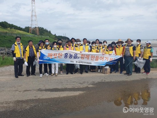 9-1.홍농읍 주민자치위원회 환경정화활동.jpeg